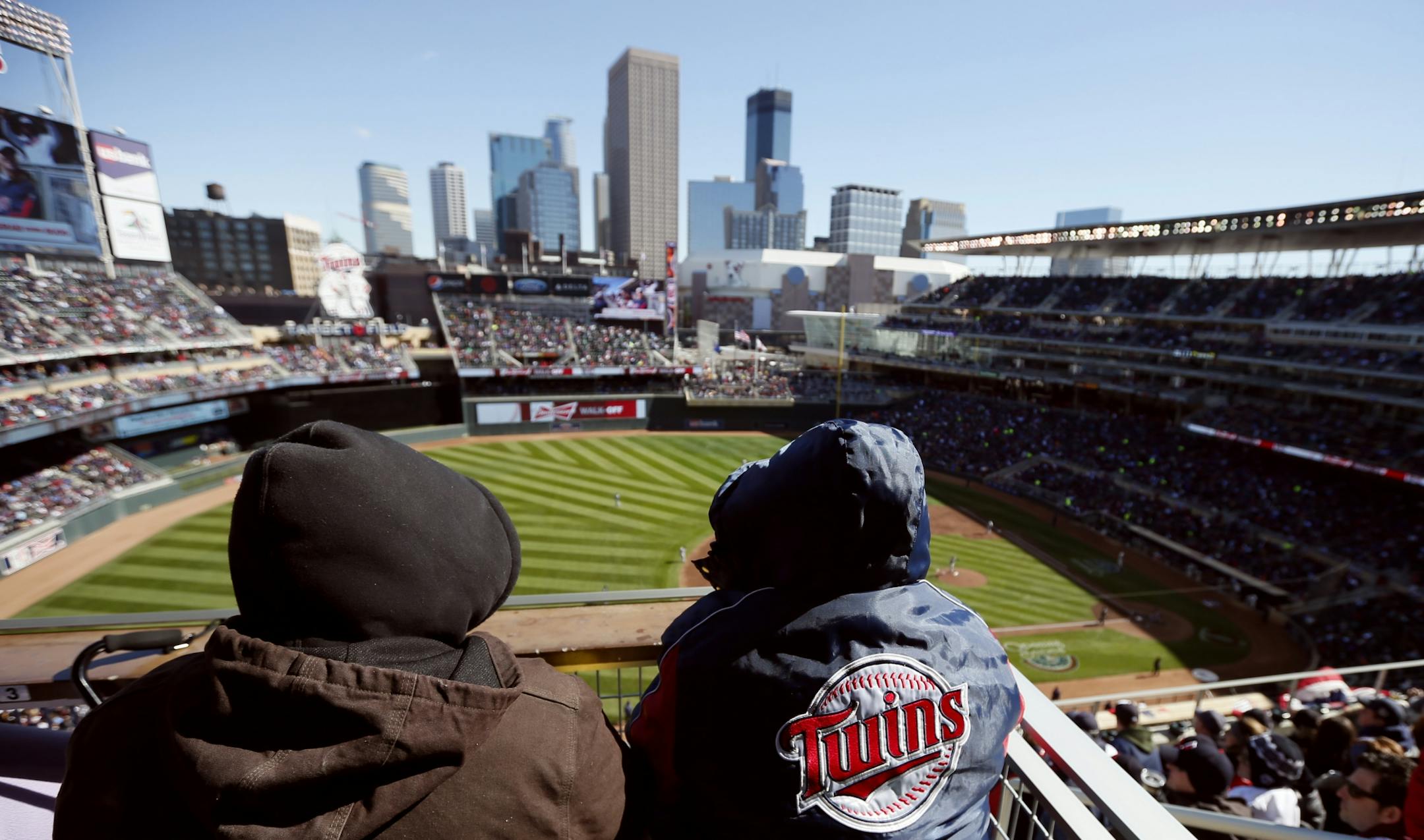 Minnesota Twins fans try to stay warm on opening day in the upper deck at Target Field , Monday April, 01, 2013 in Minneapolis, MN.