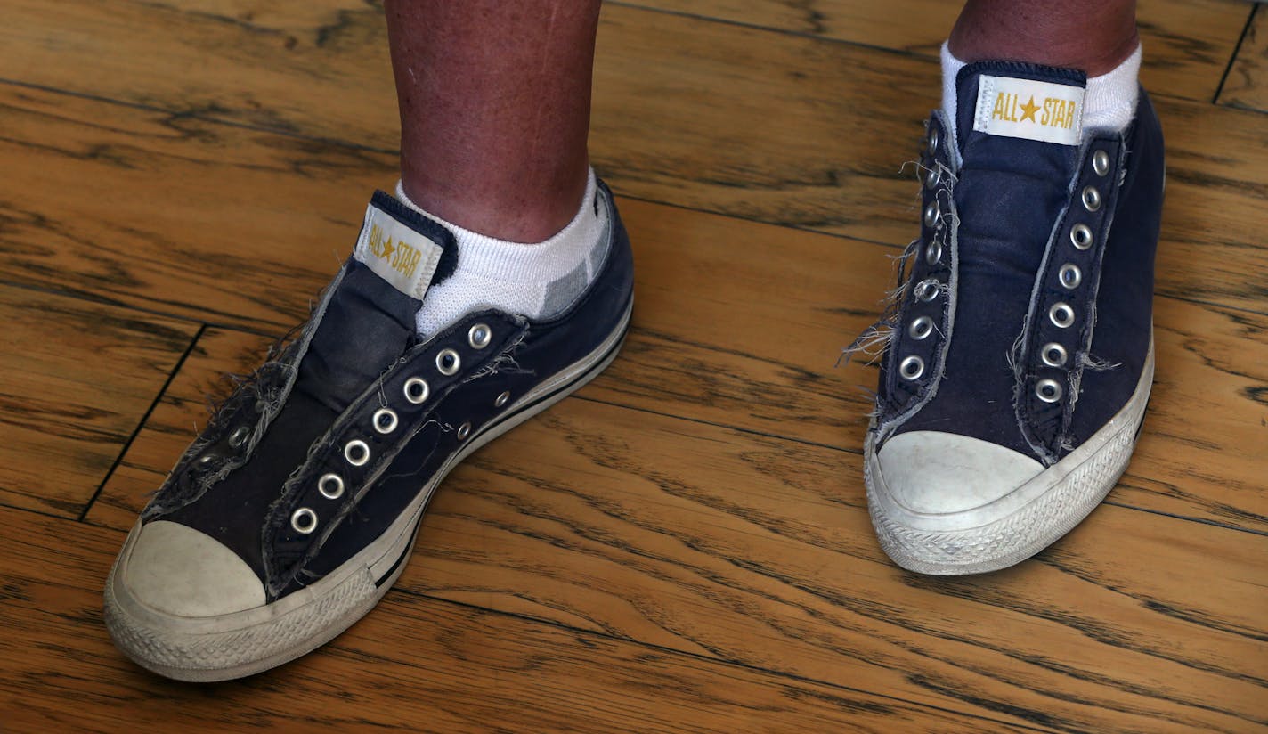 Bob Emfield, Orono resident, one of the founders of the Tommy Baham line was interviewed on 7/12/13 at his home. His no shoe strings reflects the Tommy Bahama style. Tommy Bahama turned 20 this year. The iconic menswear brand, with its loose-fitting silks and palm tree emblems, started in Florida, but it's a Minnesotan who's responsible for creating the fictional icon to middle-aged American men, and giving him his name. Bruce Bisping/Star Tribune bbisping@startribune.com Bob Emfield/source.