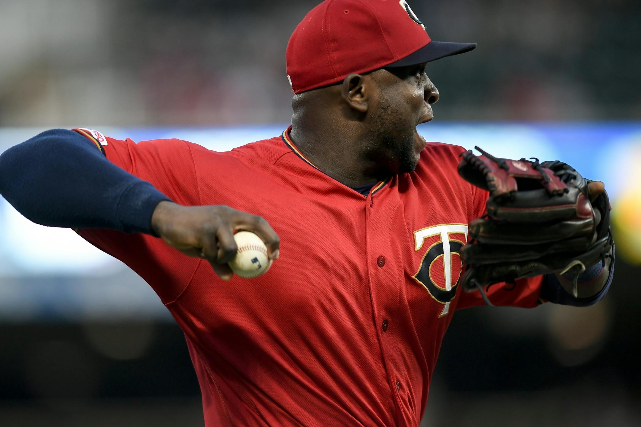 Minnesota Twins third baseman Miguel Sano (22) fielded a single hit by Kansas City Royals first baseman Ryan McBroom (9) in the top of the second inning.