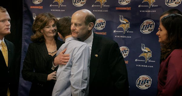 Brad Childress was surrounded by family when he was introduced as the new Vikings head coach in 2006.