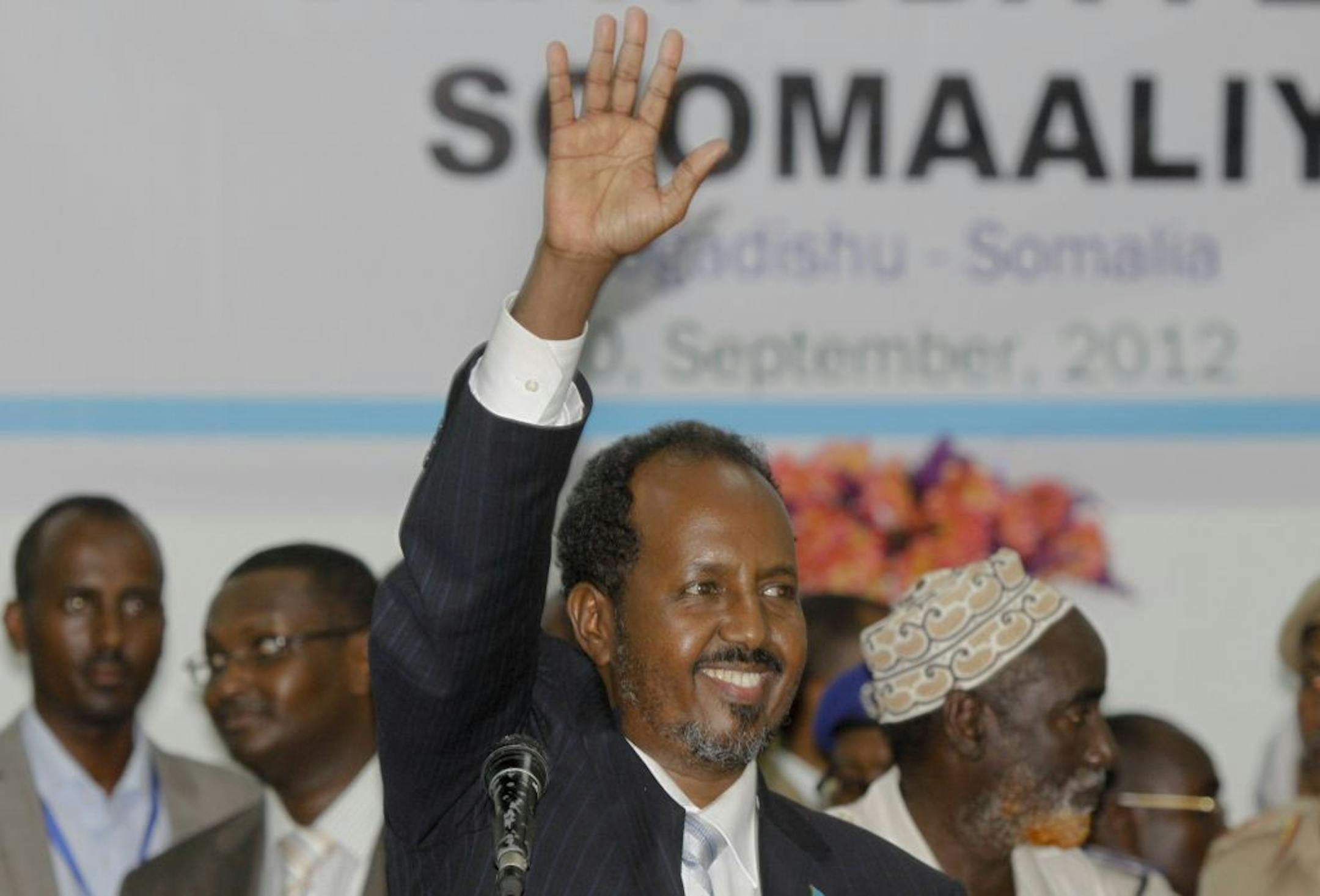 Somalia's new president Hassan Sheikh Mohamud, a political newcomer, speaks at a ceremony after being elected by the Parliament over outgoing President Sheik Sharif Sheikh Ahmed who conceded defeat, in Mogadishu, Somalia Monday, Sept. 10, 2012. Somalia's Parliament elected a new president of the country's fledgling government Monday, a move that members of the international community say is a key step toward the east African nation's transition from a war-torn failed state to a nation with an ef