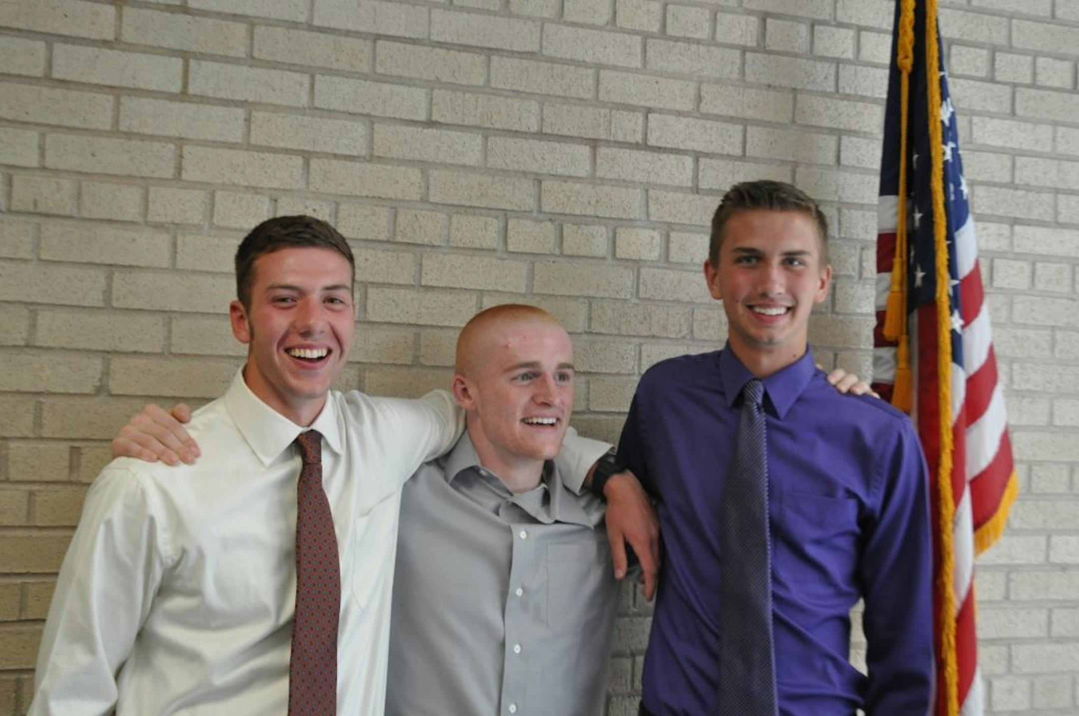 From left to right: Bryce Wilberding, Adam Jackson and Stephen Sawyer on Rosemount High School military recognition day in 2012. Photo courtesy of Nikki Jackson.