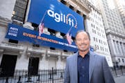 Agiliti CEO Tom Leonard outside the New York Stock Exchange when they completed their IPO.