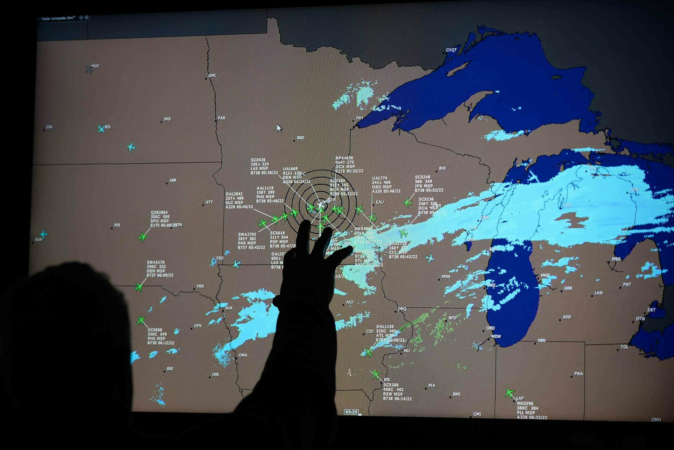 Jose Beltran, an airside duty manager for the Metropolitan Airports Commission, showed a map of the region, including air traffic to and from MSP as well as a snow band which missed the Twin Cities. ] AARON LAVINSKY &#xef; aaron.lavinsky@startribune.com Thursday and Friday are among the busiest days of the holiday travel season at the Minneapolis-St. Paul International Airport. MSP is a 24/7 city unto itself, but who are its night dwellers? Who shovels the tarmac after midnight, bakes the croiss