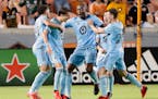 From left to right, Minnesota United’s Hassani Dotson, Adrien Hunou, Fanendo Adi, Ethan Finlay and Will Trapp celebrate a goal by Hunou against Hous