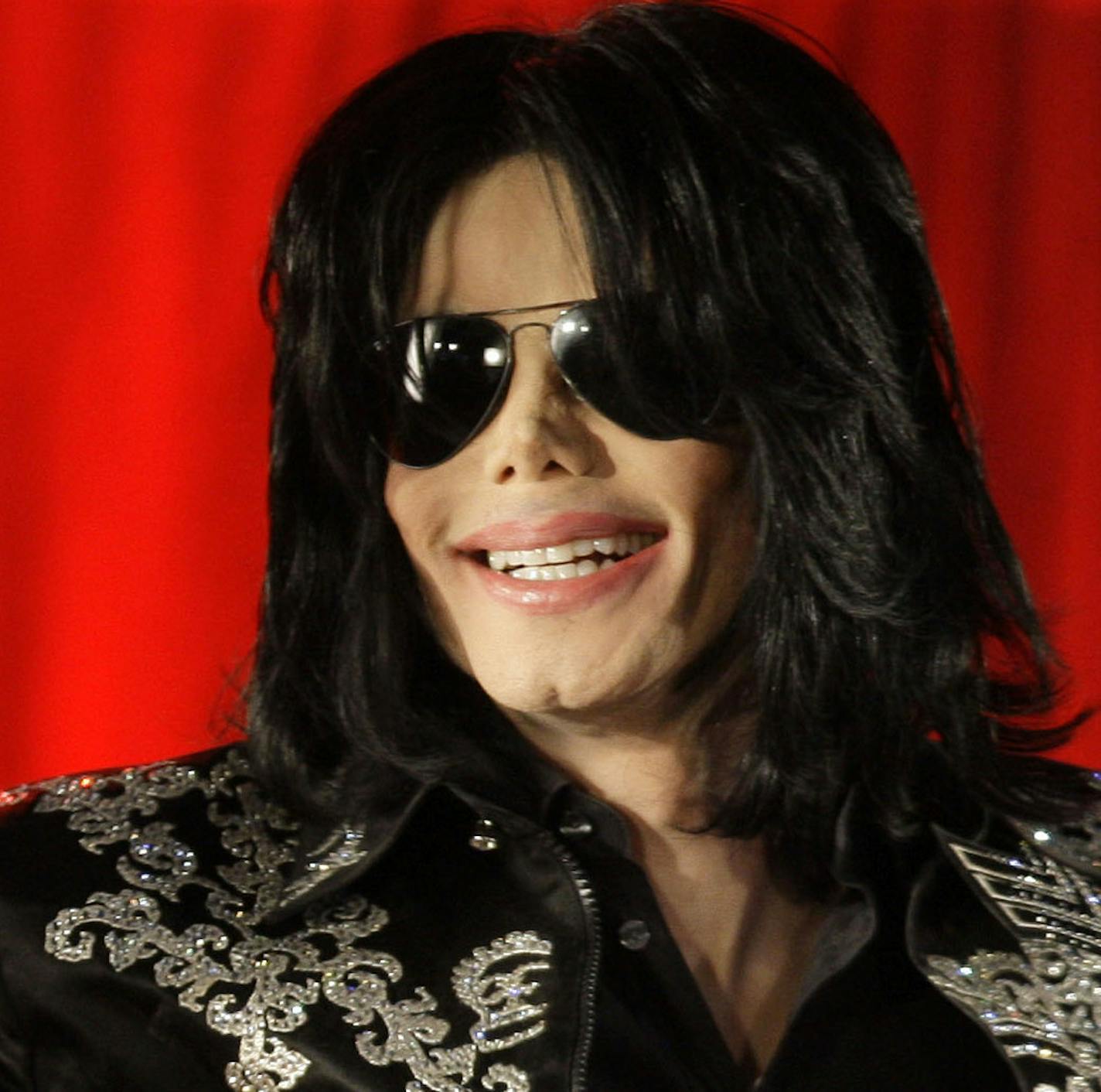 FILE - In this March 5, 2009 file photo, singer Michael Jackson announces that he is set to play ten live concerts in London. Jackson, who died in 2009, keeps his 1.8 million followers informed with new music and videos. In May 2015, his label EPIC Record and the Estate of Michael Jackson premiered the singer's "A Place with No Name" video on the social network. The tweet has garnered more than 2.7 million views, helping gain 136,000 followers in one day. A spokesperson from Jackson's estate sai