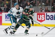 Wild defenseman Jonas Brodin battles for the puck Thursday against San Jose. His return from injury will be crucial if the Wild are going to make up g