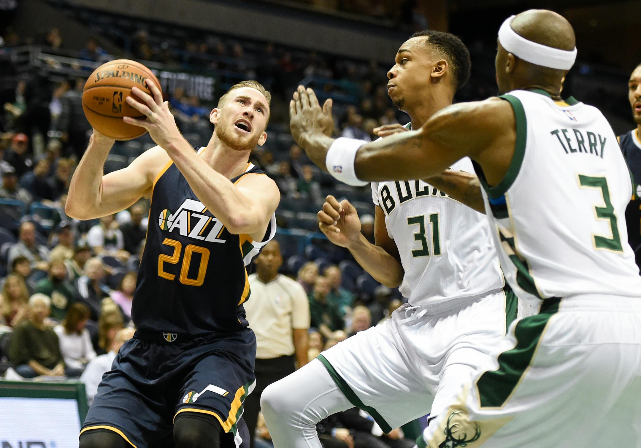 Utah Jazz's Gordon Hayward (20) shoots against Milwaukee Bucks' John Henson (31)and guard Jason Terry (3) in the second half during an NBA basketball game Friday, Feb. 24, 2017, in Milwaukee. (AP Photo/Benny Sieu)