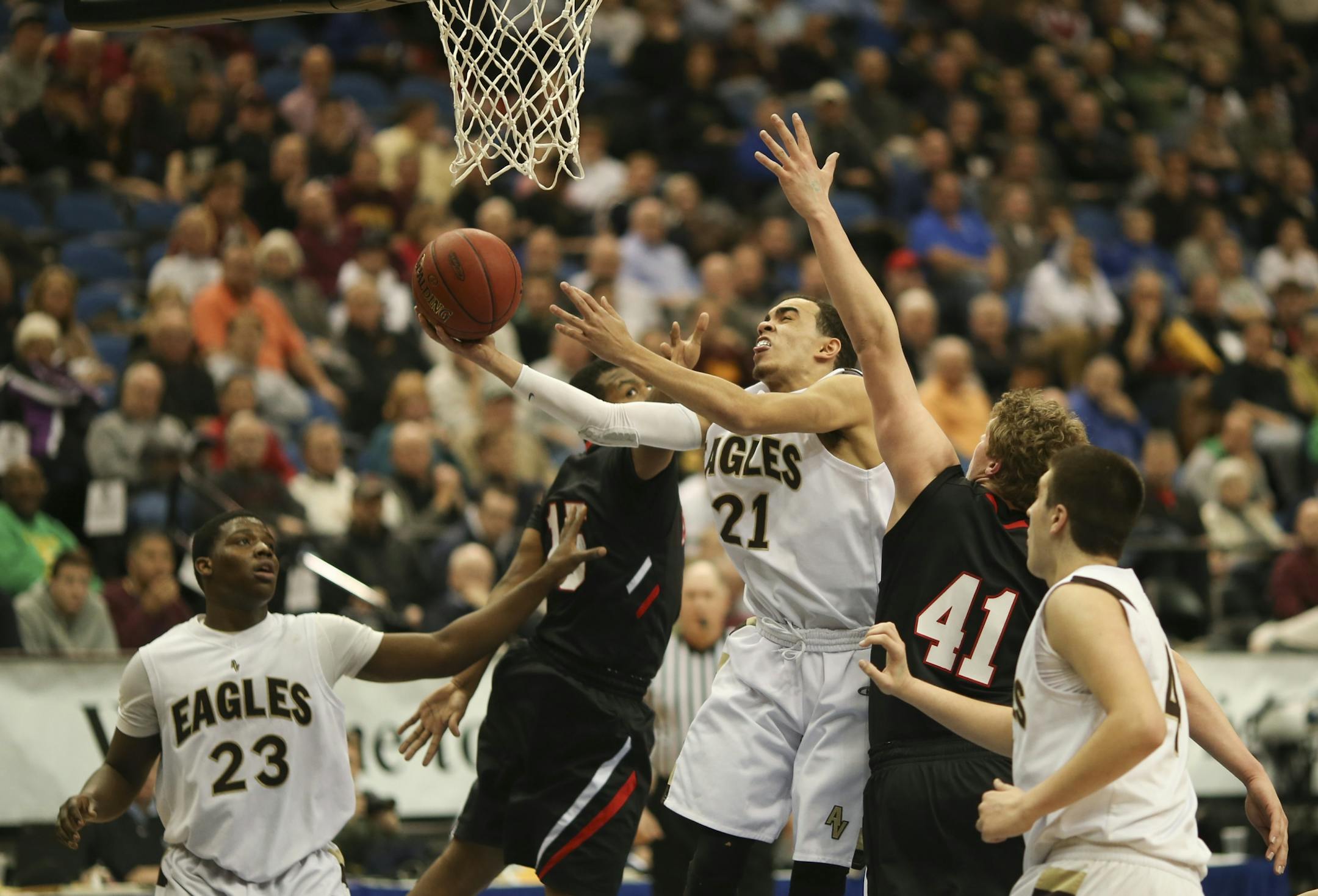 Tyus Jones of Apple Valley drove through traffic to put up a first half shot Thursday night.