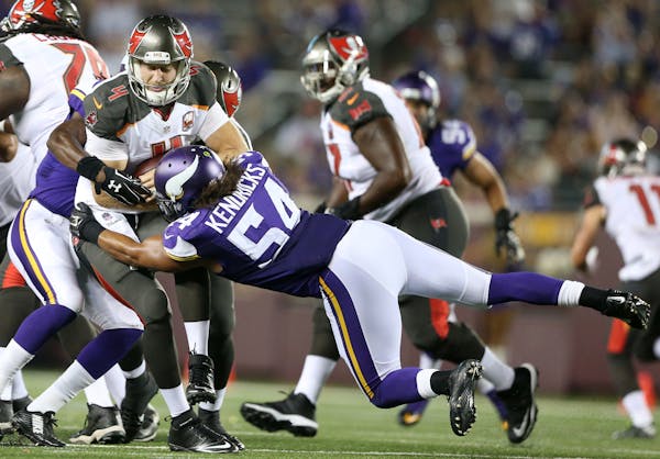 Vikings inside linebacker Eric Kendricks (54) sacked Buccaneers quarterback Seth Lobato in the fourth quarter during a preseason game.