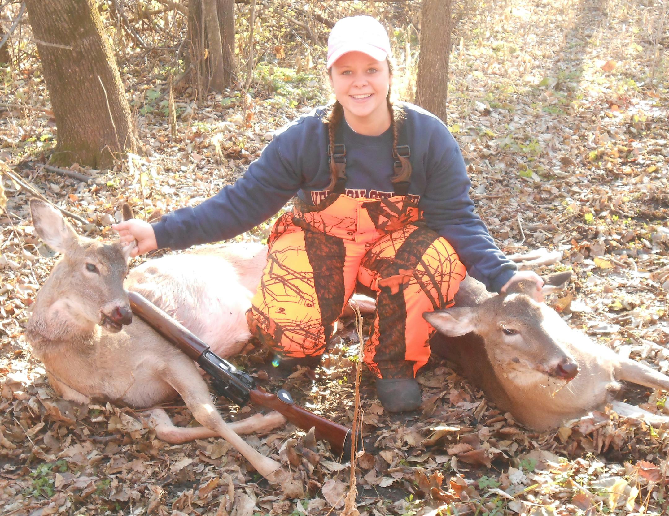 Darian Peterson with two does she bagged opening weekend of the deer season, hunting with her dad.
