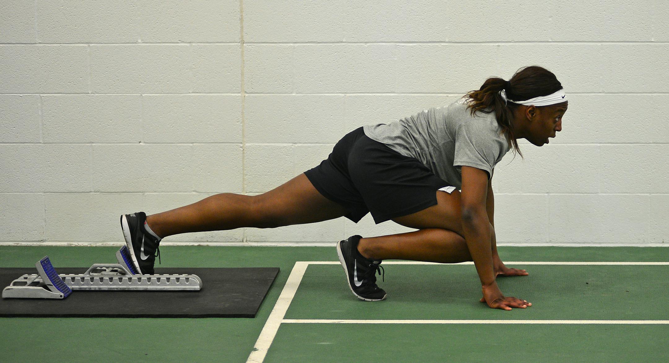 Temi Ogumrinde. is a three sport athlete at Park of Cottage Grove. and is going to run track for the University of Minnesota next year. She was working on starting blocks and sprint conditioning ]Richard.Sennott@startribune.com Richard Sennott/Star Tribune Cottage Grove, Minn.Tuesday 3/31/2014) ** (cq)