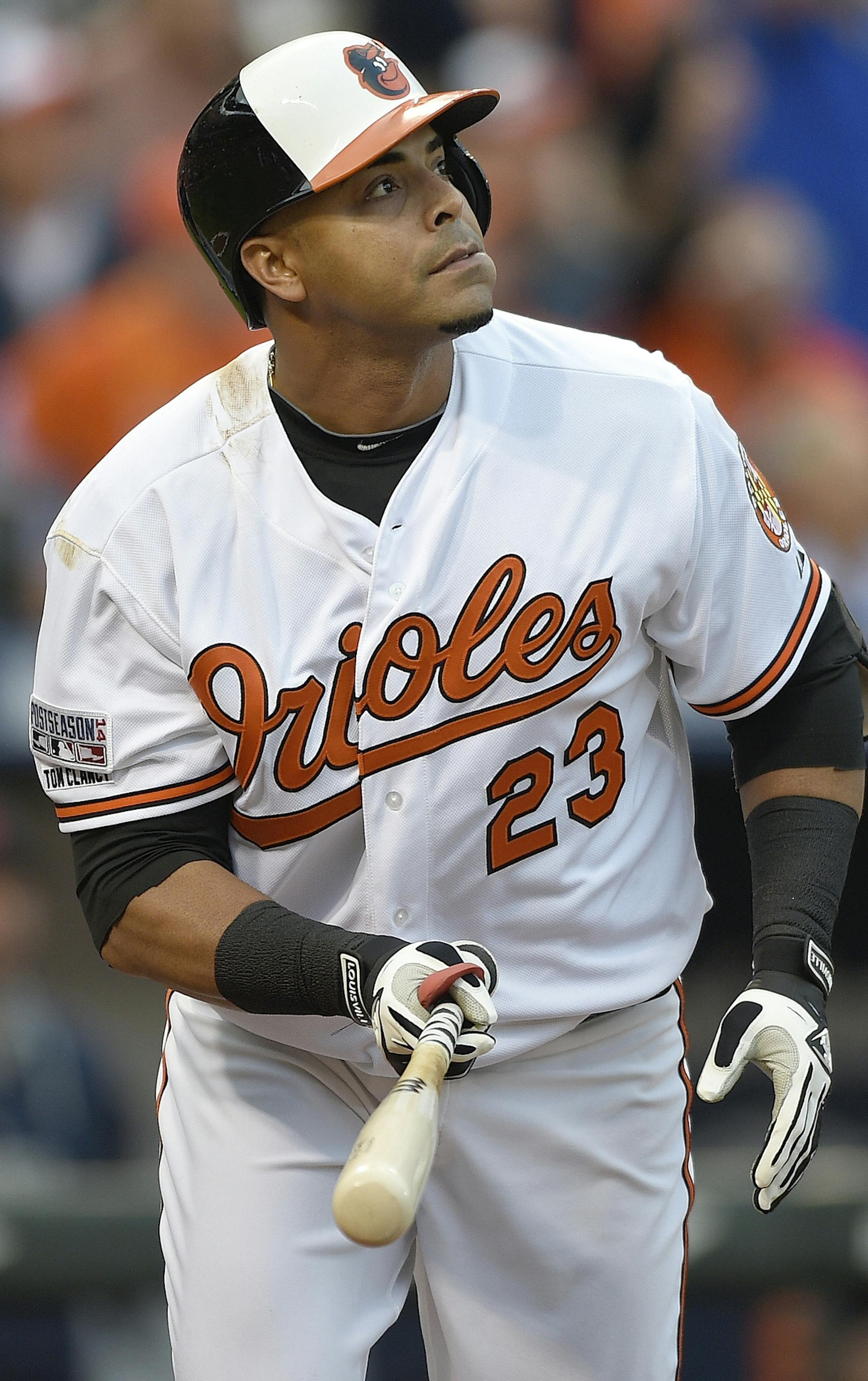 Baltimore Orioles designated hitter Nelson Cruz (23) watches his two-run homer against the Detroit Tigers in the first inning during Game 1 of baseball's AL Division Series, Thursday, Oct. 2, 2014, in Baltimore. (AP Photo/Nick Wass) ORG XMIT: BAB115