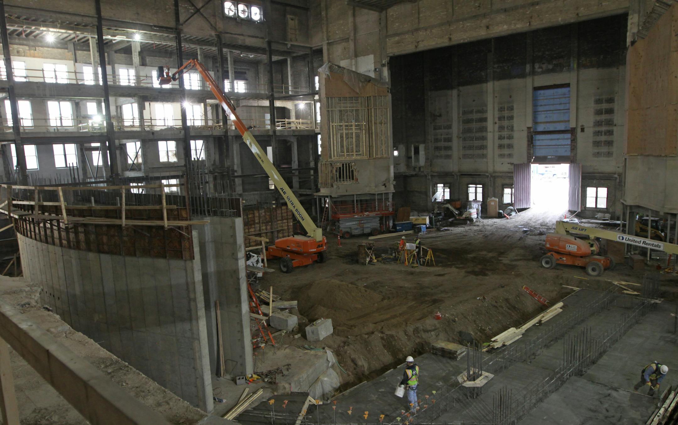Workmen have started rebuilding the interior of Northrop Auditorium.