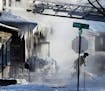 St. Paul firefighters at the scene of a house fire at Hatch Ave. and Park St. Wednesday, Jan. 30, 2019, In St. Paul, MN.