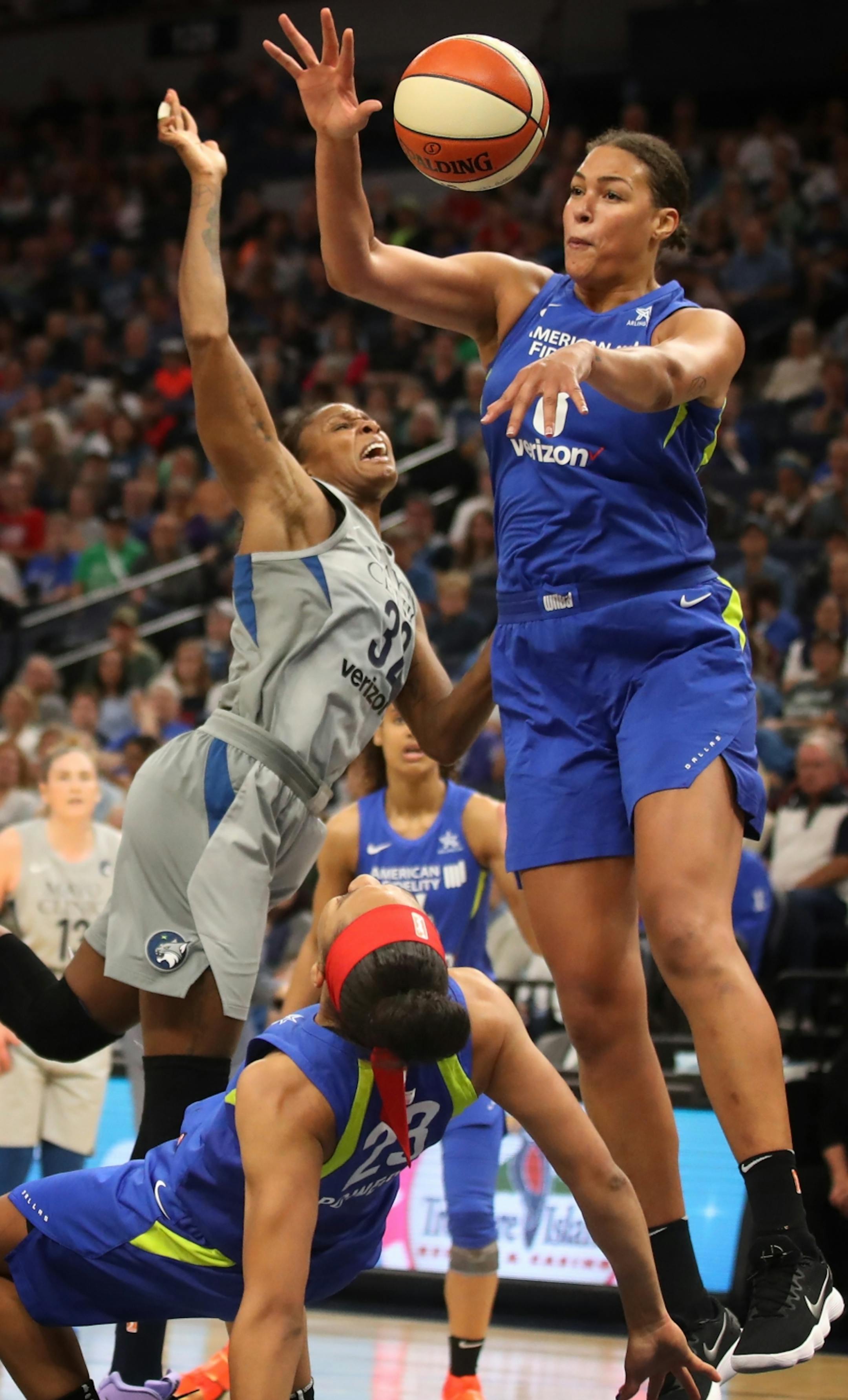 Lynx Rebekkah Brunson lost control of the ball , as Wings Liz Cambage played good defense at Target Center Tuesday , June 19, 2018 in Minneapolis, MN.