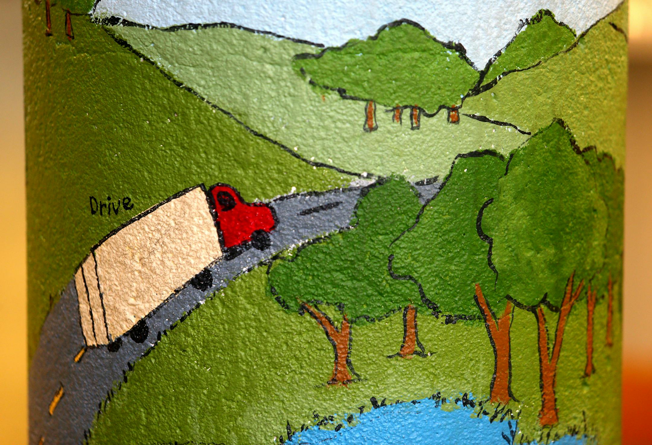 Julie Prairie, a mural artist for the Children's Museum painted a pillar in Wescott Library in Eagan. ] JOELKOYAMA‚Ä¢jkoyama@startribune Minneapolis, MN on May 8, 2014. Julie Prairie, a mural artist for the Children's Museum will do some more painting in Wescott Library in Eagan.