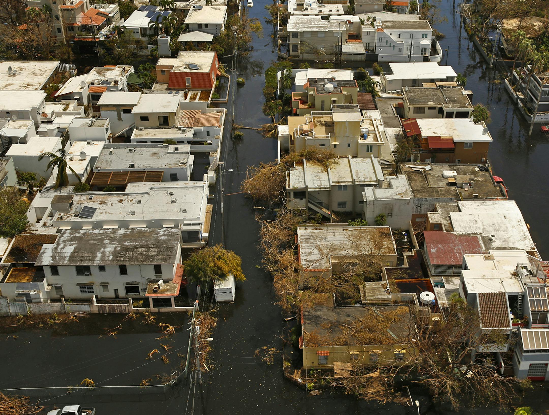 Four months after the devistation of hurricane Maria, pictured, a third of the population is still without power. (Carolyn Cole/Los Angeles Times/TNS) ORG XMIT: 1232244