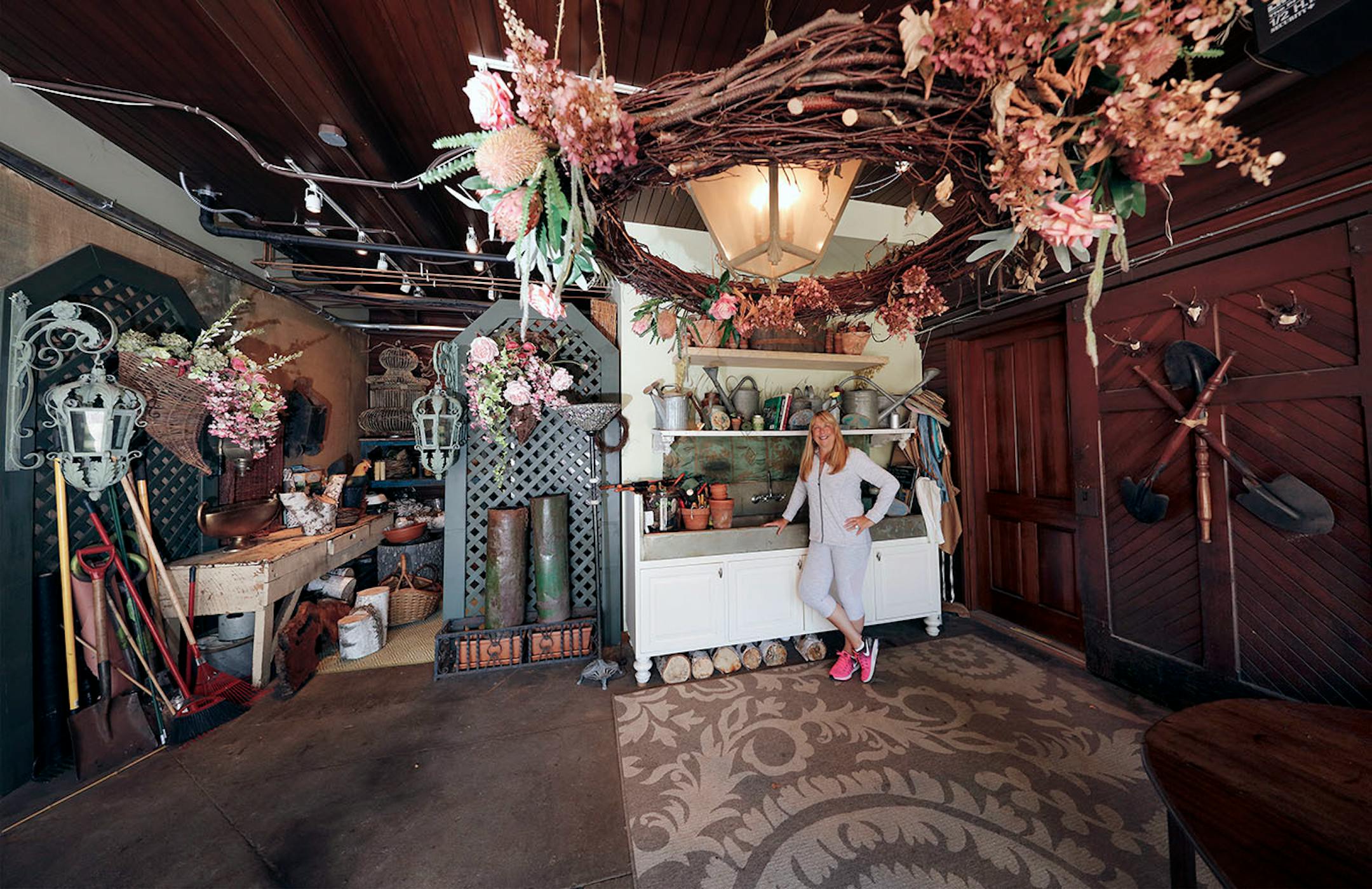 Homeowner Shari Wilsey in her potting shed inside the carriage house.
