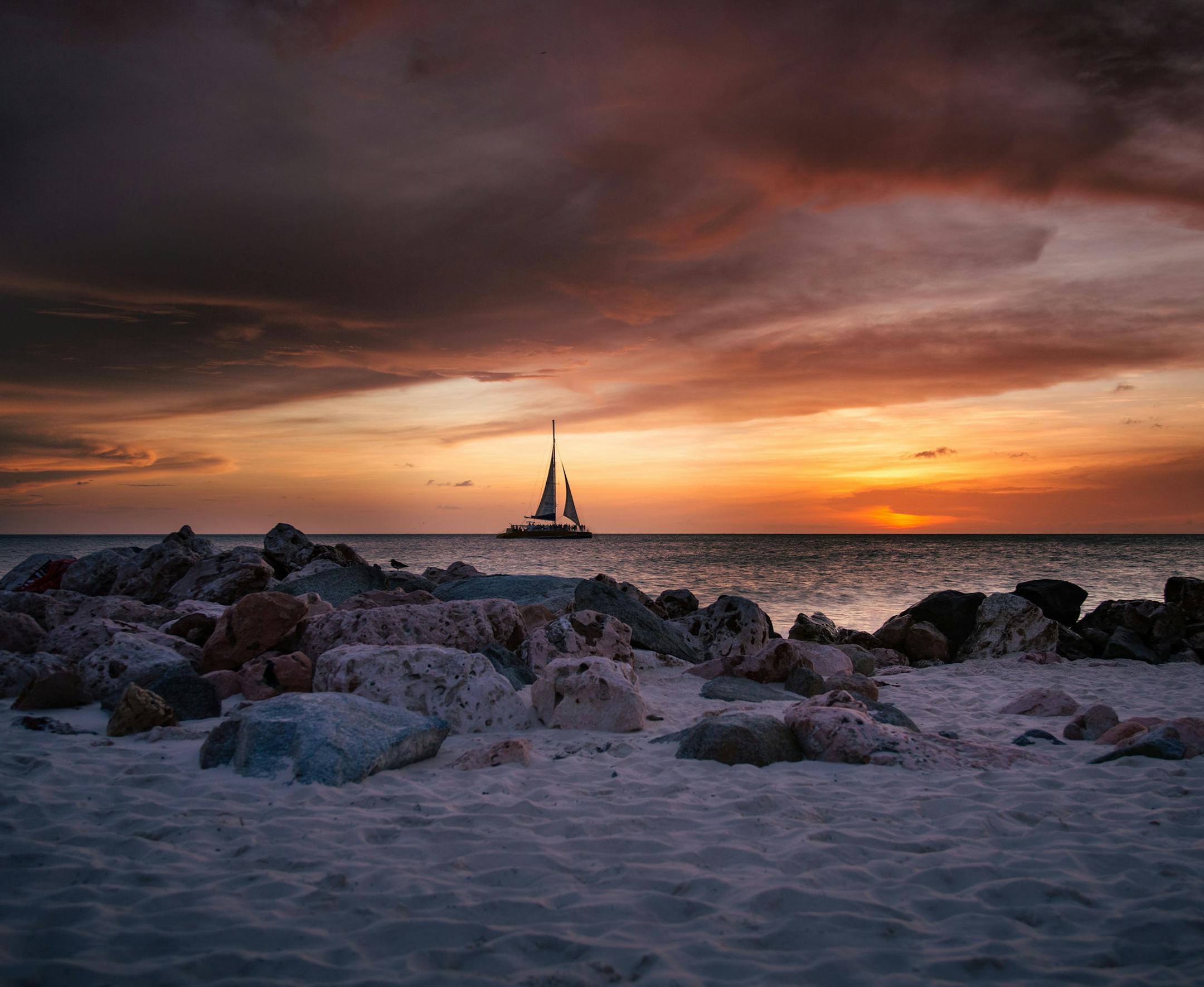 Ryan Karlstad
Stillwater, MN Where were you when you took this photo? What does it show? Just north of Oranjestad, Aruba What equipment did you use—a phone or a particular camera? This photograph was shot using a Canon 5D Mark III using a Canon 24-105mm lens. I used a tripod and a graduated ND filter. How did you get this shot? Did you employ any particular technique: did you get low or high to change the angle, or wait just for the right moment? During our stay in Aruba, I saw this parti
