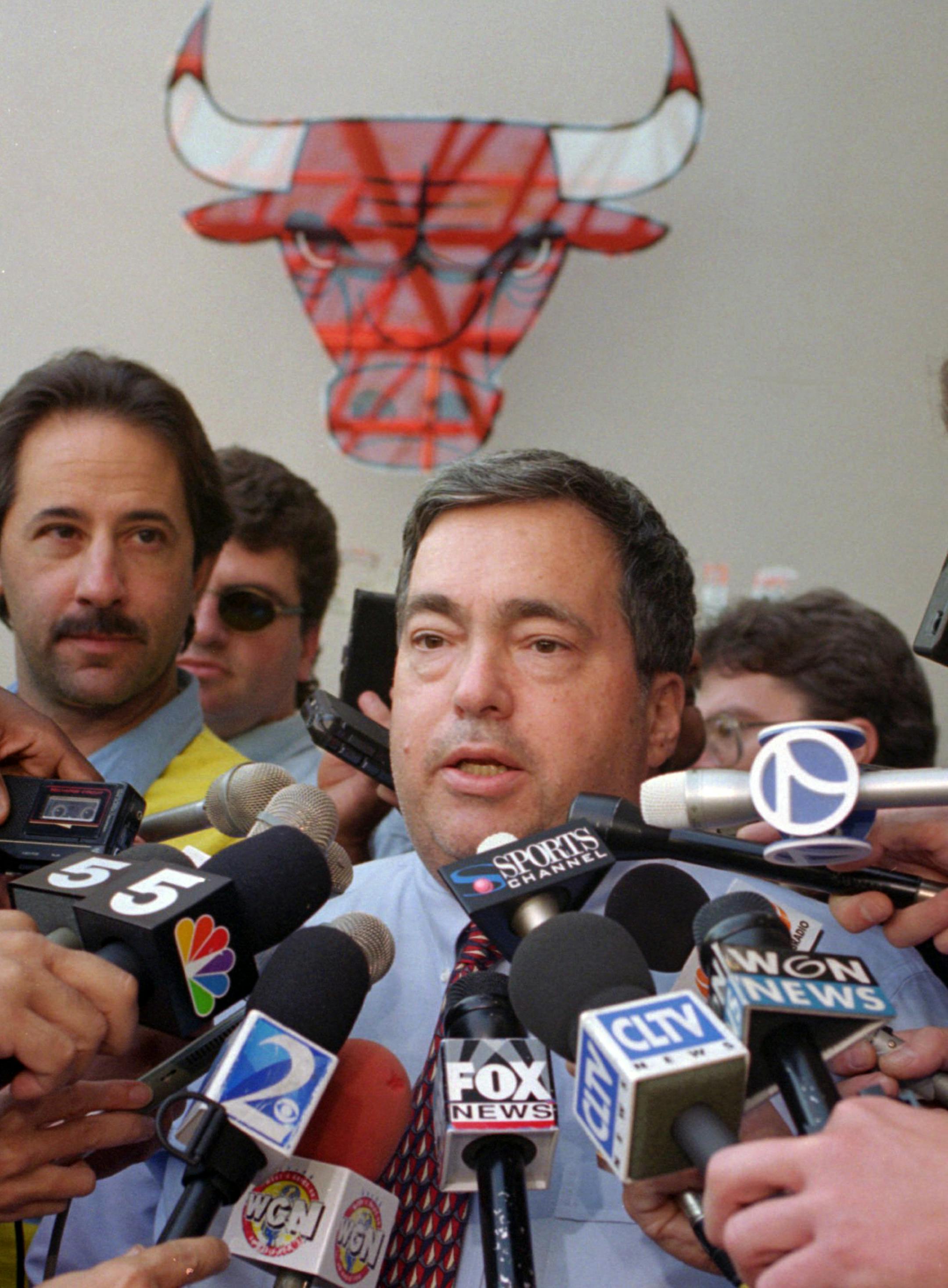 FILE - In this Oct. 2, 1995, file photo, Chicago Bulls general manager Jerry Krause speaks to the media in Deerfield, Ill., about trading center Will Perdue for the flamboyant San Antonio Spurs' Dennis Rodman. Krause, the executive behind the Bulls' six NBA titles, has died, the team announced Tuesday, March 21, 2017. He was 77. (AP Photo/Michael S. Green, File)
