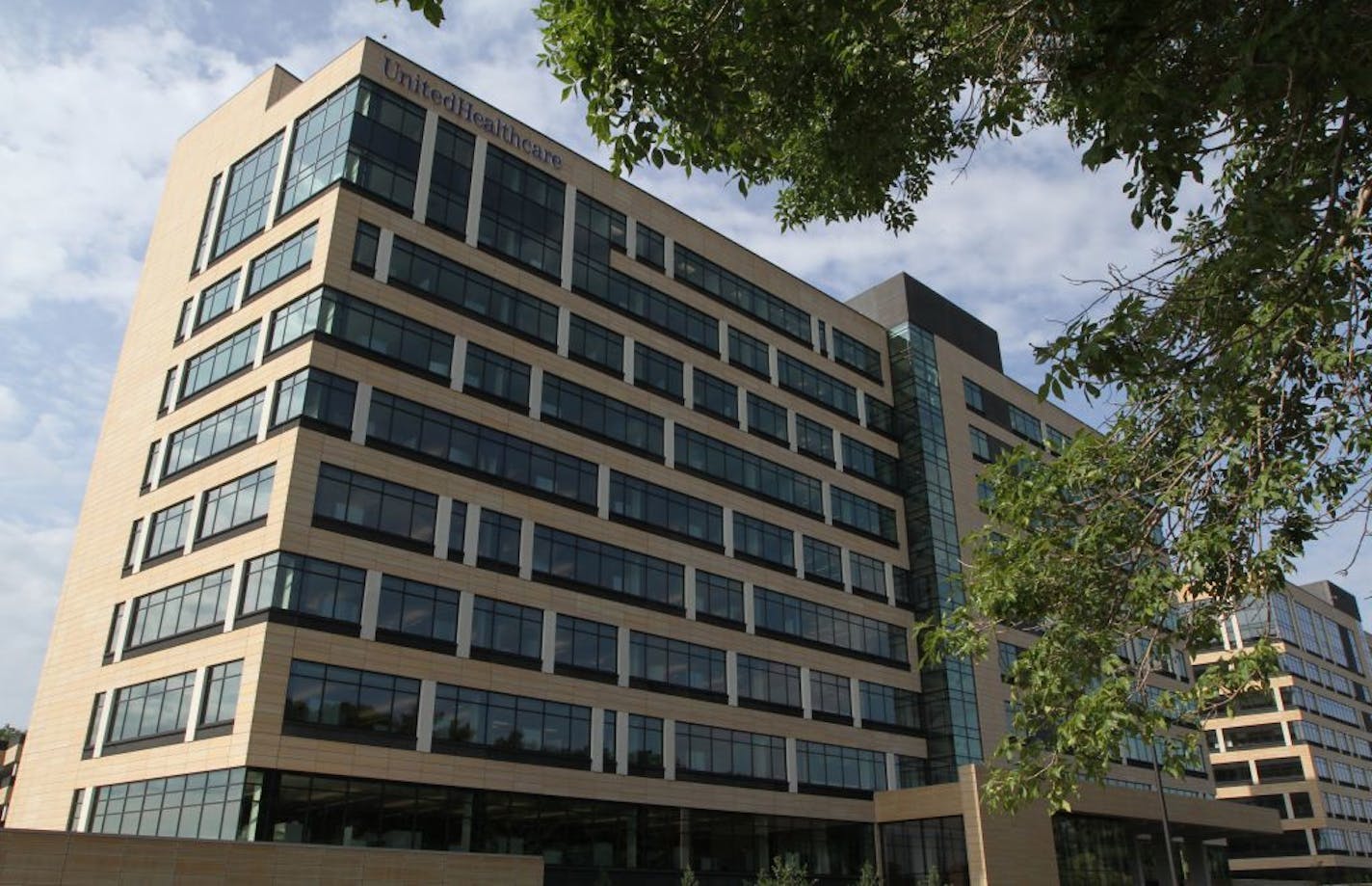 UnitedHealth Group signed up nearly 10 million new members in the second quarter, helping drive its profit past Wall Street expectations. Pictured is a UnitedHealth affiliate building in Minnetonka.