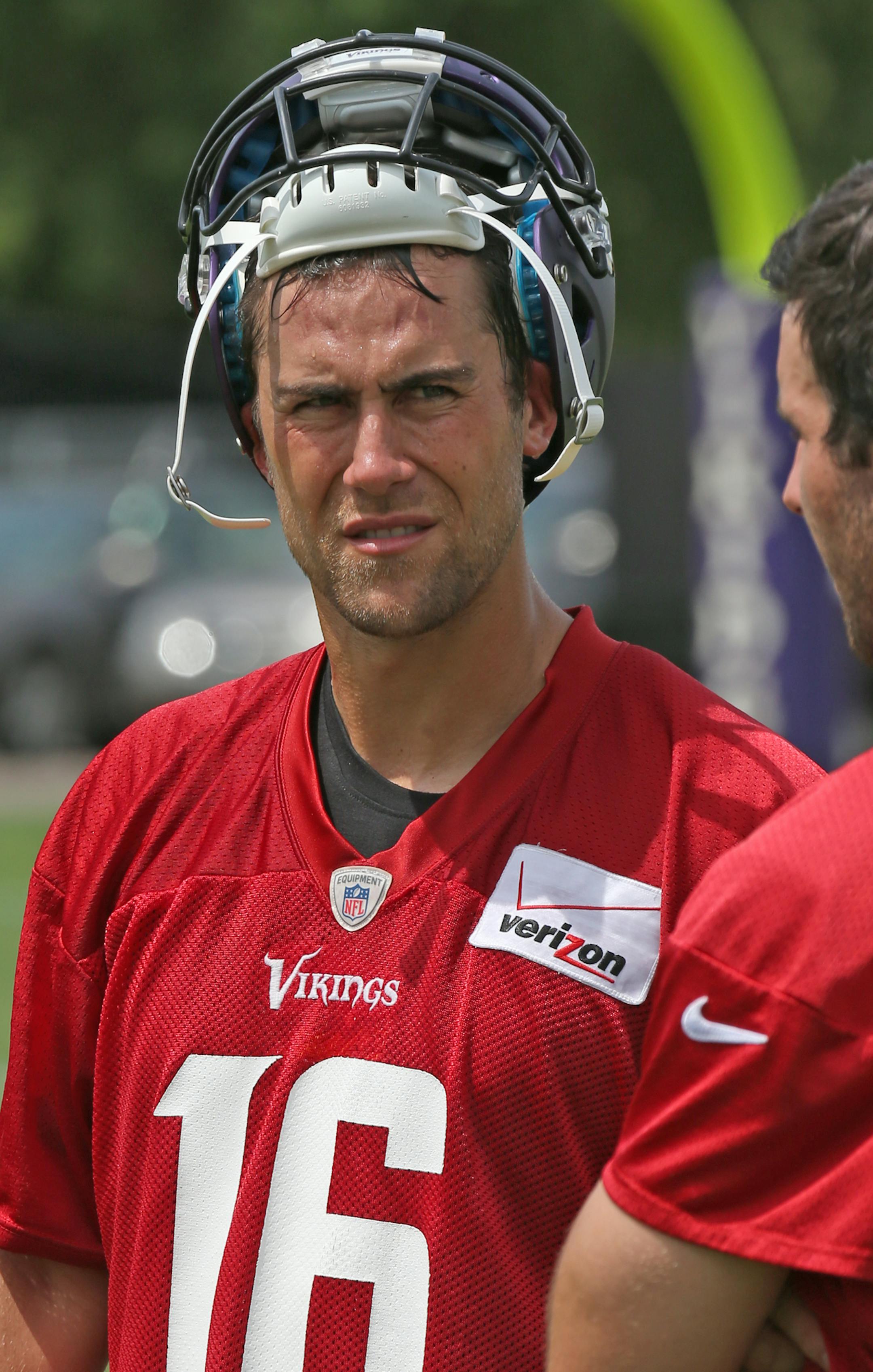 (left to right) Vikings Quarterbacks Matt Cassel and Christian Ponder talked at the end of mini-camp practice at Winter Park on 6/18/14.] Bruce Bisping/Star Tribune bbisping@startribune.com Matt Cassell, Christian Ponder/roster. ORG XMIT: MIN1406181639290741