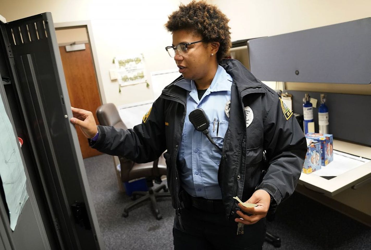 St. Paul Police Department community liaison officer Rae Brown had hoped to join the St. Paul police force as a patrol officer but budget cuts caused the cancellation of the SPPD's fall academy. Brown will instead take a job as a patrol officer in Maplewood and was seen Wednesday in St. Paul. Brown described it as "bittersweet," to leave the St. Paul police department but also that she is "very excited," to start her new job in Maplewood.