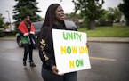 Minneapolis NAACP President Nekima Levy-Pounds took part in a peace walk to the site of Thursday night's fatal shooting of 59-year-old Birdell Beeks.