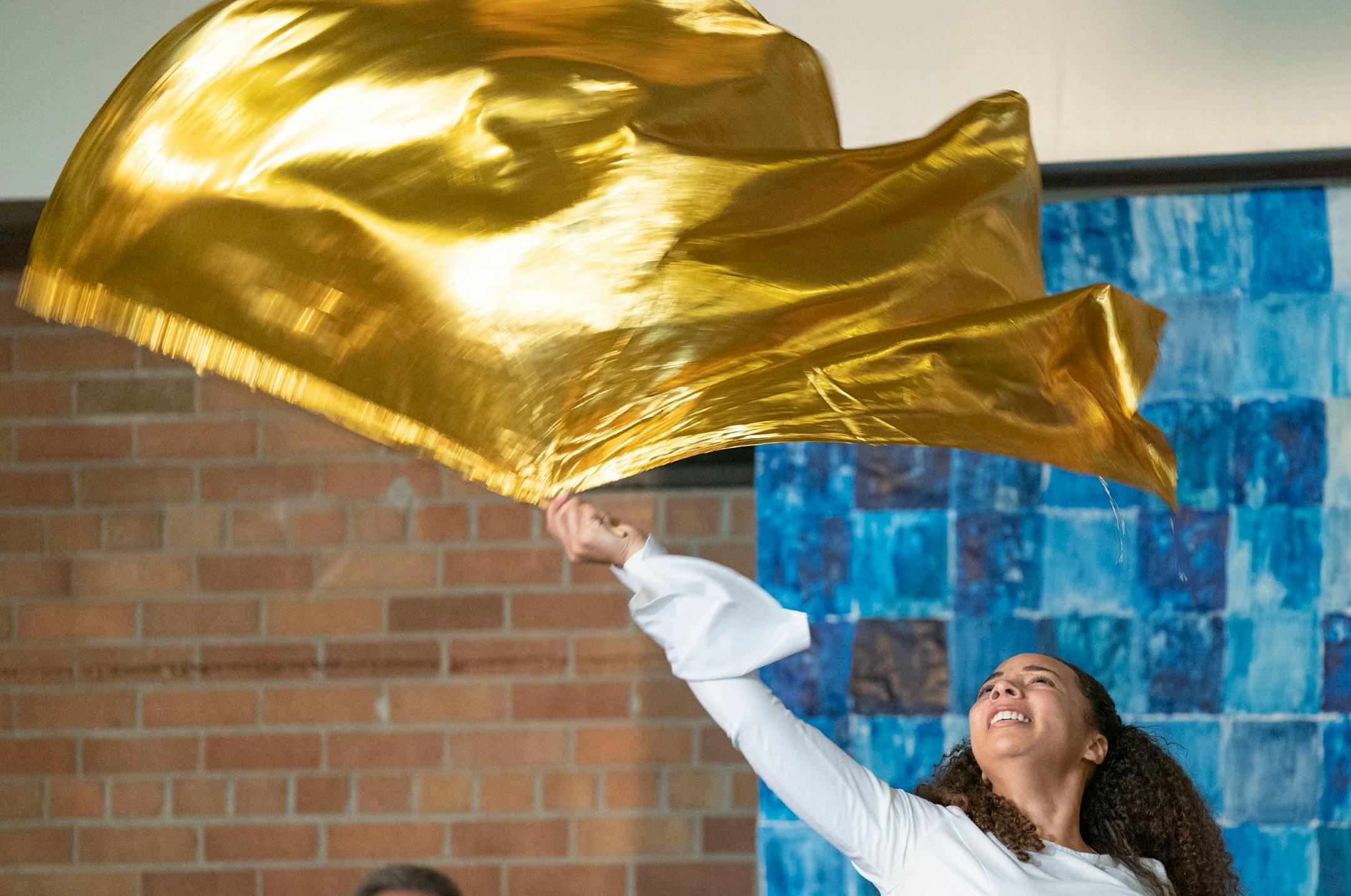 April Elliis performs a praise dance during Jahmari Rice's funeral.