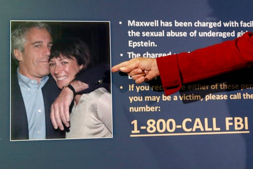 Audrey Strauss, acting U.S. Attorney for the Southern District of New York, points to a photo of Jeffrey Epstein and Ghislaine Maxwell during a July 2 news conference, in New York.