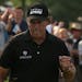 Phil Mickelson celebrates a birdie during the final round of the PGA Championship at Valhalla Golf Club in Louisville, Ky., on Sunday, Aug. 10, 2014. 