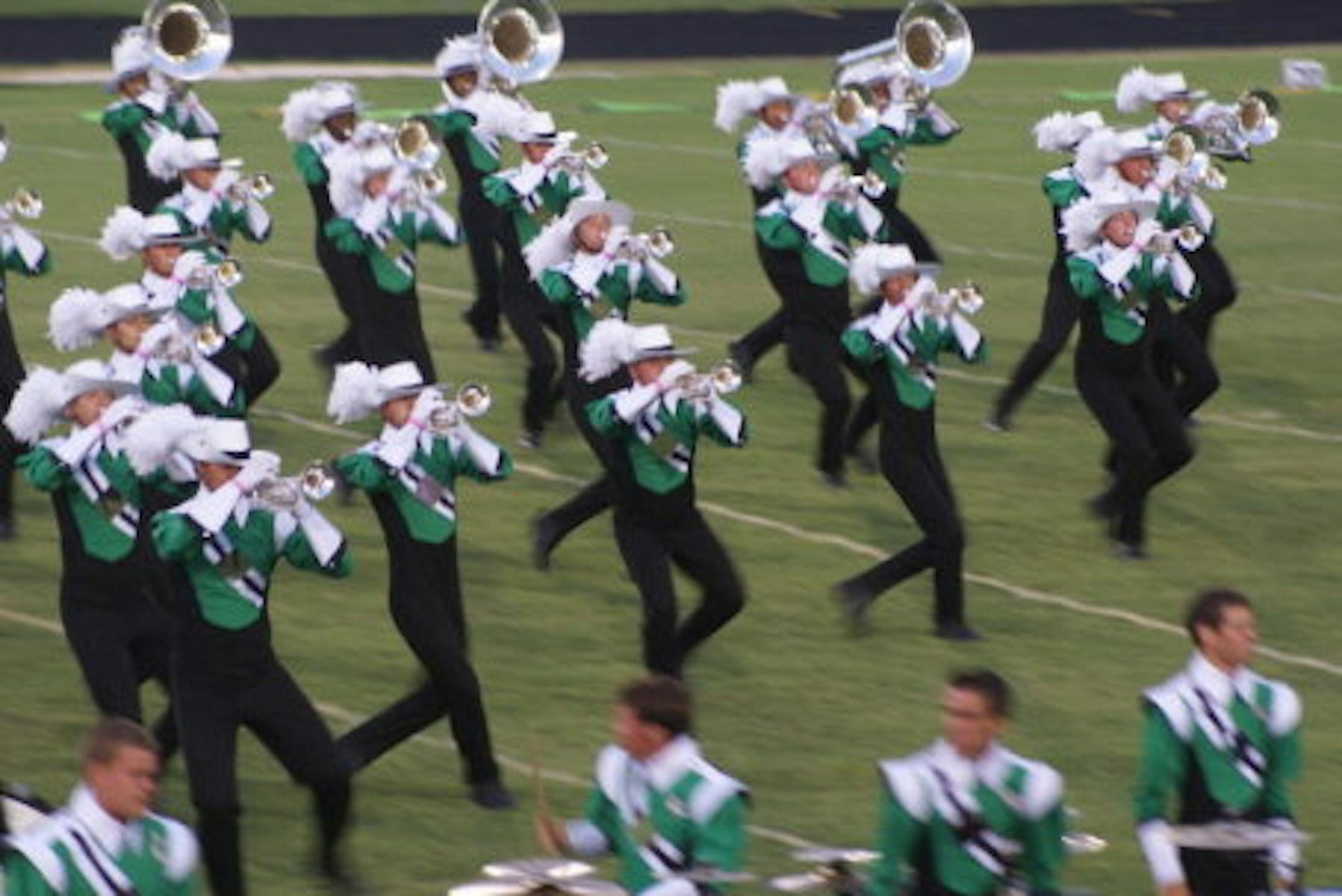 The Cavaliers horn line speeds across the field during a recent competition in Chesapeake, Va. (Photo: Bob Cannon)