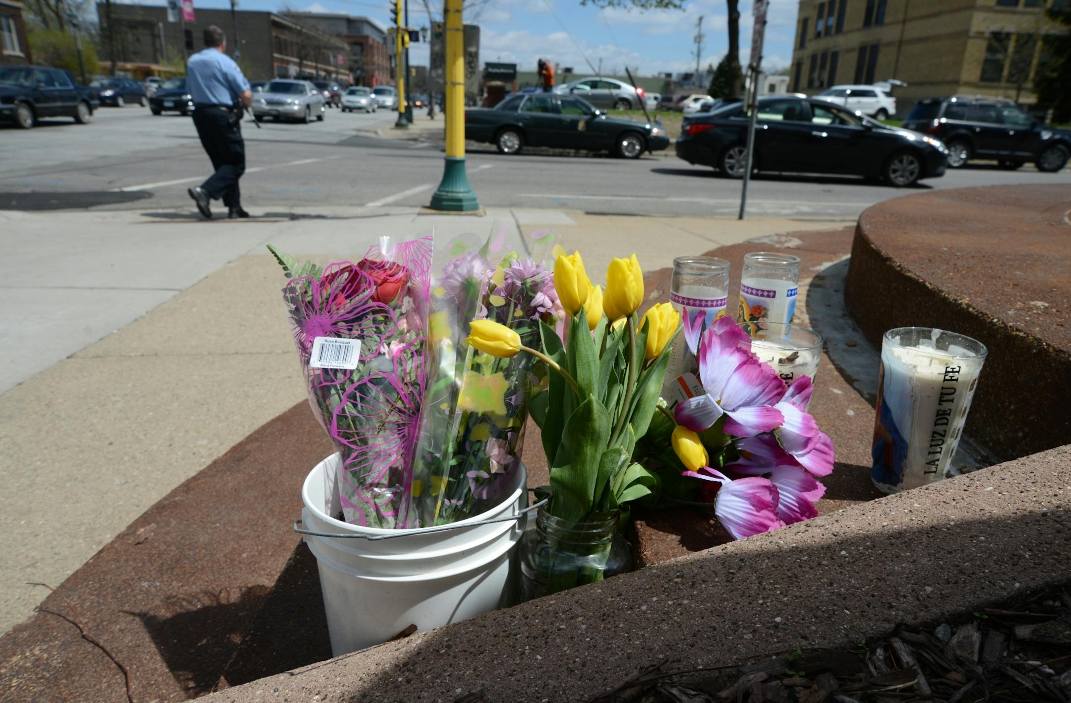 The driver of the motorcycle, Ivan Romero Oliveras, was killed during crash with a police squad at the intersection of 26th , was killed during crash with a police squad at the intersection of 26th Street and Blaisdell Avenue. His passenger, Joselin Torrejon, was injured and is listed as serious at HCMC. The crash happened as police officers were responding to the scene where 2 Minneapolis police officers were shot . Friends and family left flowers and lit candles at crash scene.
