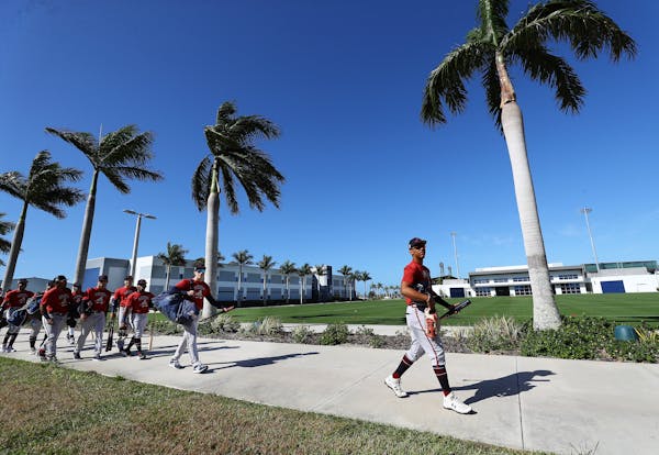 Time to get back to work, boys: Atlanta Braves minor-league players headed to a practice field this week.