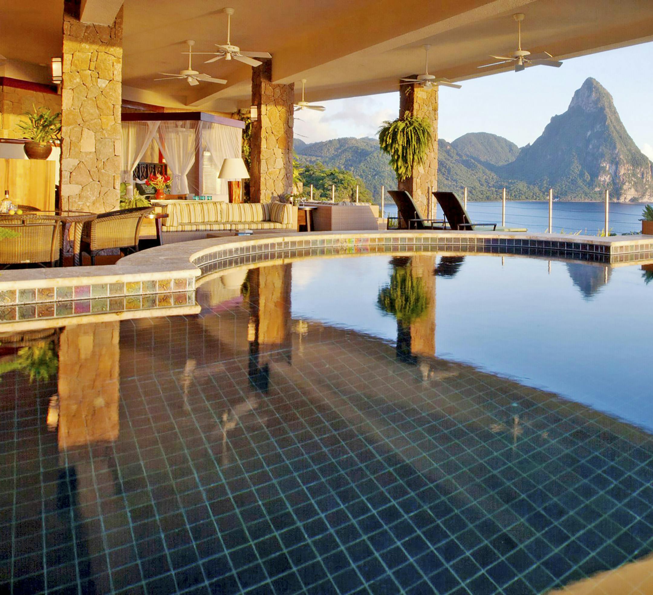 -- PHOTO MOVED IN ADVANCE AND NOT FOR USE - ONLINE OR IN PRINT - BEFORE APRIL 21, 2019. -- A photo provided by Jade Mountain of its resort in St. Lucia, where open-air rooms eliminate the need for air-conditioning. Hotels and resorts have started to be more sustainable by ramping up efforts to reduce or eliminate completely their resource and energy consumption. (Jade Mountain via The New York Times) --NO SALES; FOR EDITORIAL USE ONLY WITH NYT STORY HOTELS SUSTAINABILITY BY CHARU SURI FOR APRIL