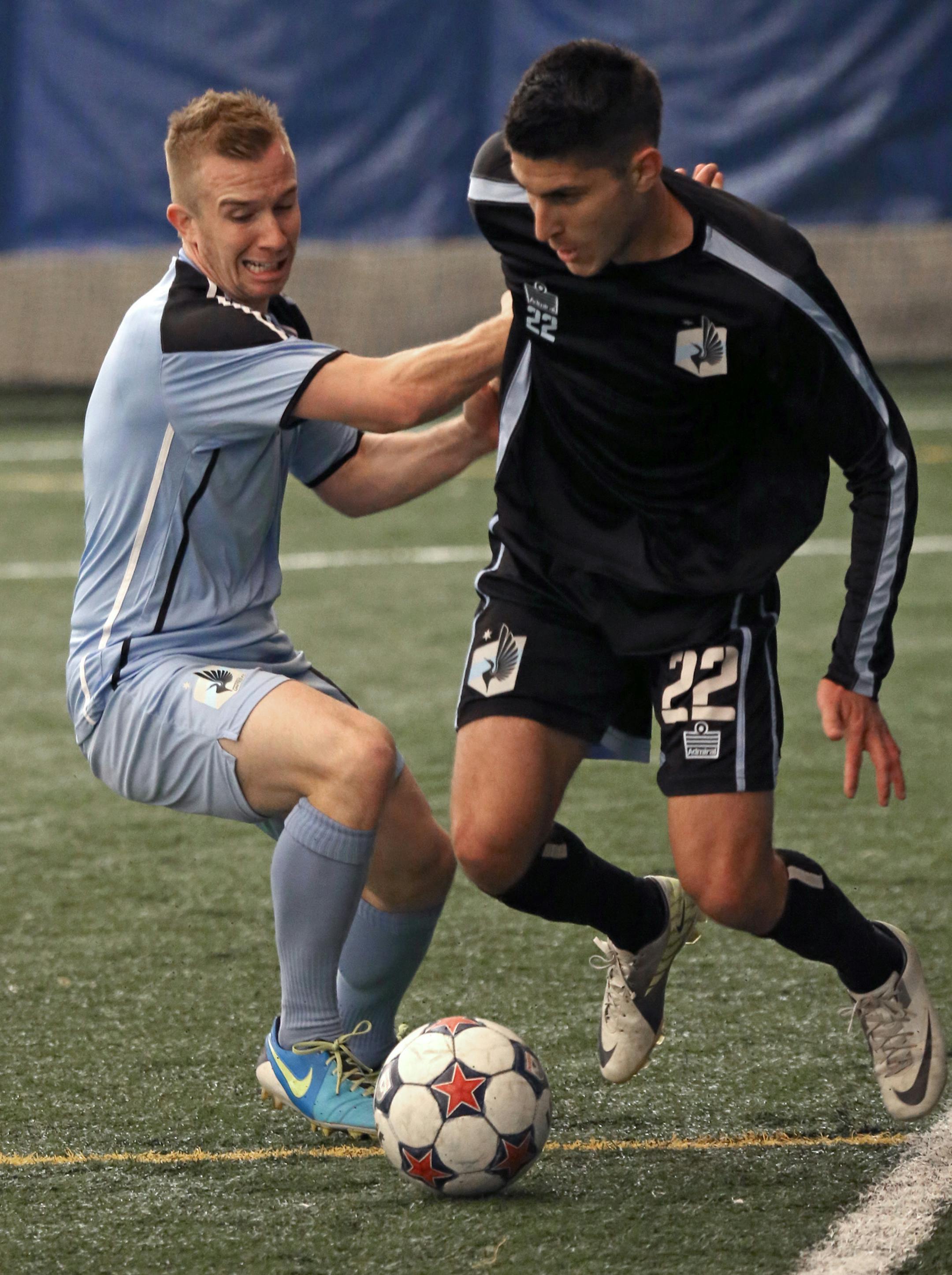 Minnesota United FC's Jamie Watson (left) and Kevin Venegas battled for the ball during a scrimmage at the Savage Sports Dome.