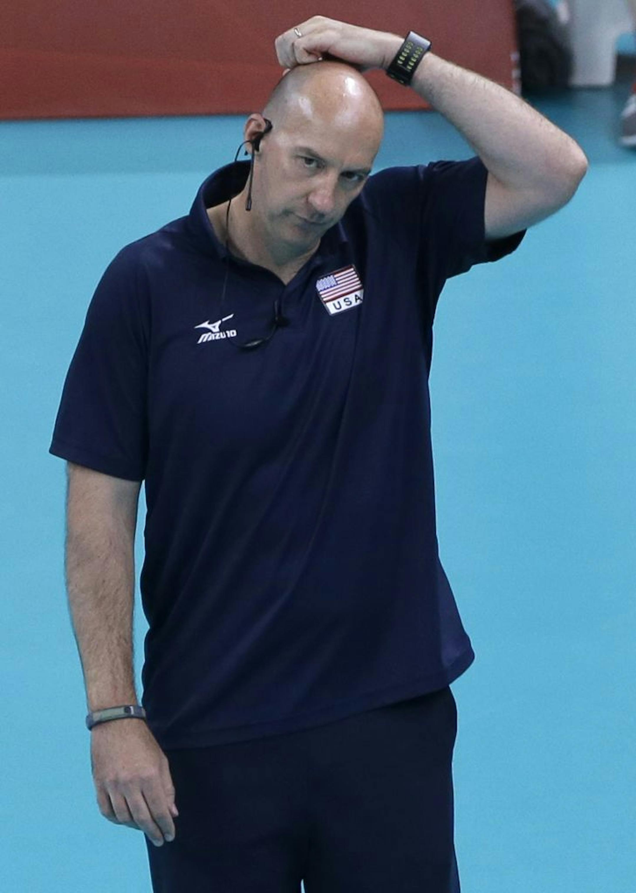 United States head coach Hugh McCutcheon stands on the sidelines during a women's gold medal volleyball match against Brazil at the 2012 Summer Olympics, Saturday, Aug. 11, 2012, in London.