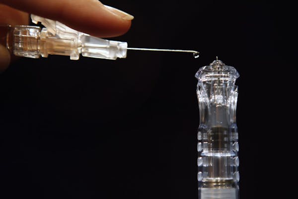 The new needle is about as long as a single drop of fluid.