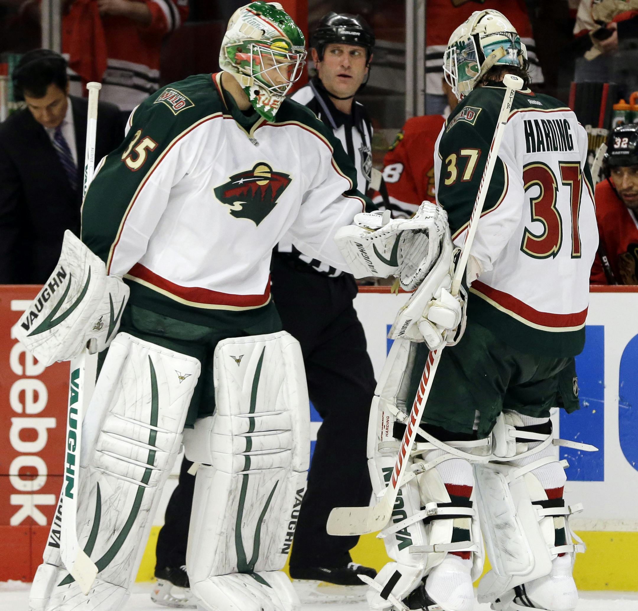 Wild goalie Darcy Kuemper, left, replaced Josh Harding during the second period of Game 5 against the Chicago Blackhawks on Thursday.