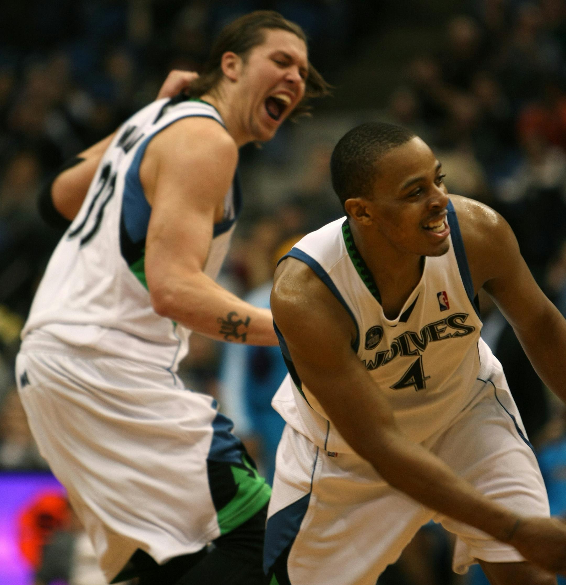 BRUCE BISPING &#xef; bbisping@startribune.com Minneapolis,MN., Friday, 1/23/2009] Wolves vs. Hornets. (left to right) Mike Miller and Randy Foye celebrated Foyes basket in the last minutes of the game to insure the Wolves win.