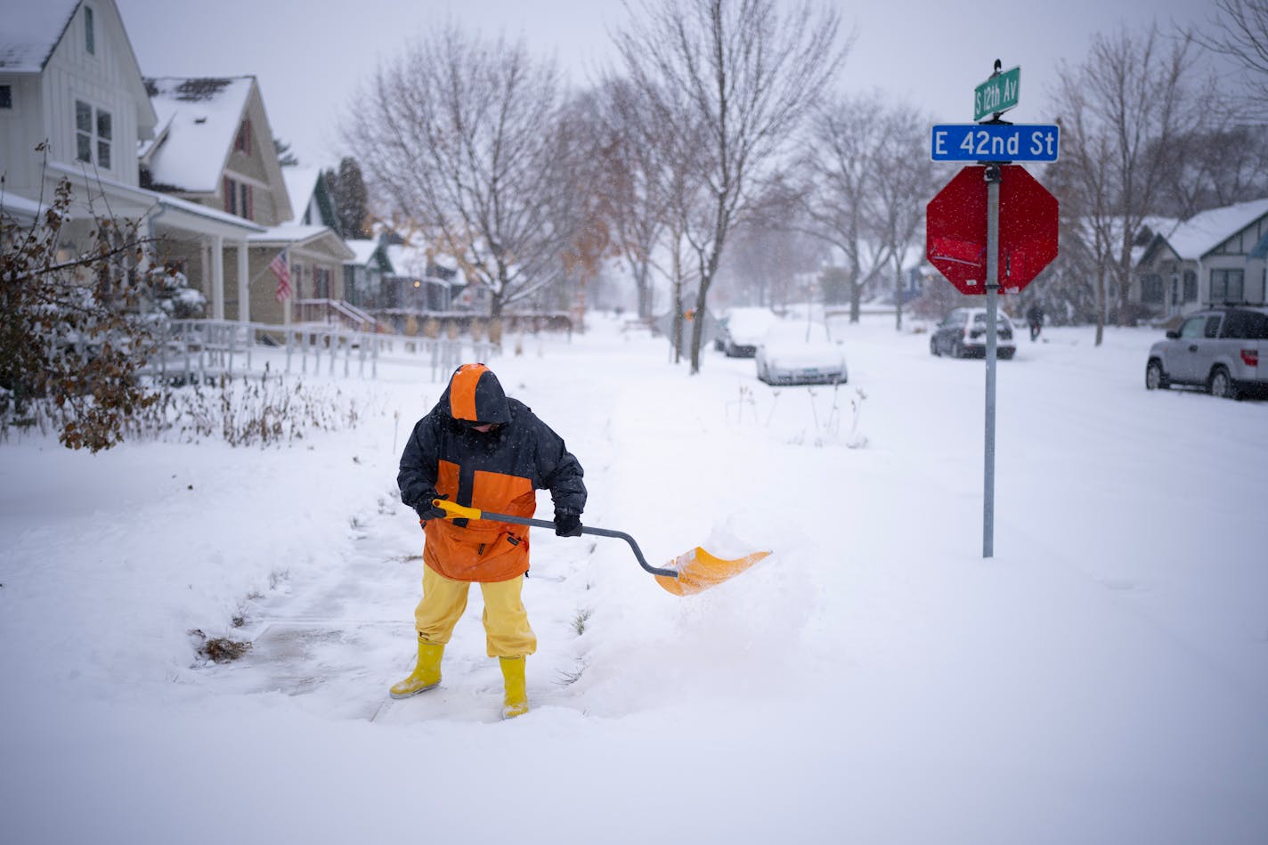 Nancy Hansen shoveled her walk for the second time of the day in Minneapolis Tuesday, Nov. 29, 2022. The season's first winter storm dumped a significant amount of snow on the Twin Cities throughout the day. ] JEFF WHEELER • Jeff.Wheeler@startribune.com