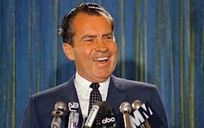 Republican presidential candidate Richard Nixon smiles during a news conference, 1968. (AP Photo) ORG XMIT: APHS108575