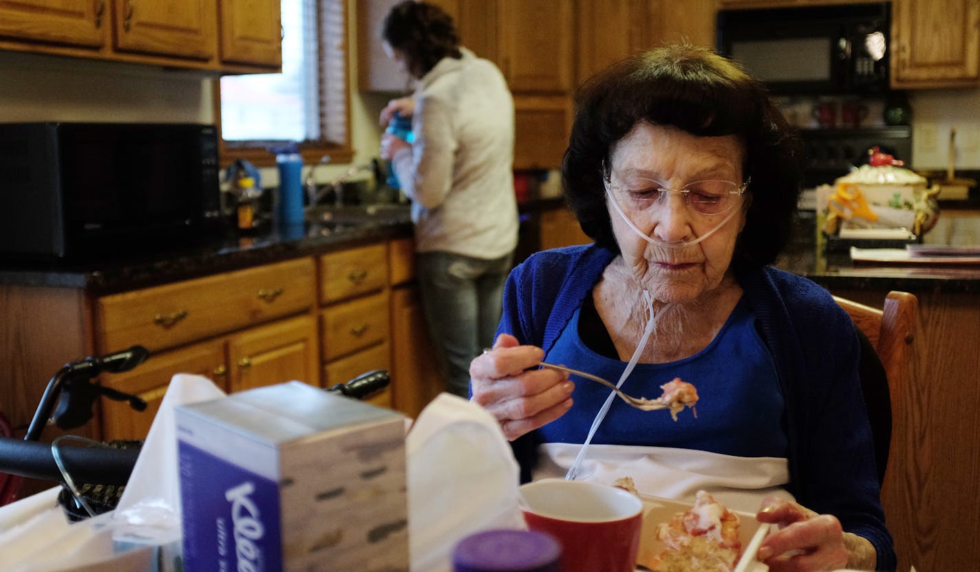 Mary Hennessy, 97, ate her Meals on Wheels lunch Wednesday. Proposed budget cuts by President Donald Trump would be a devastating blow to a program that helps millions.