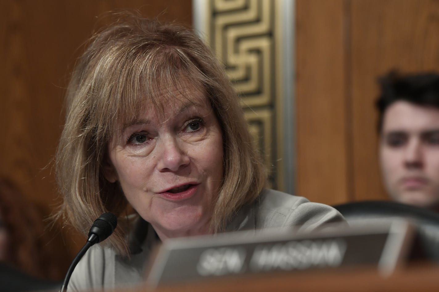 FILE - In this Sept. 24, 2019, file photo, Sen. Tina Smith, D-Minn., speaks during an executive session of the Senate Health, Education, Labor and Pensions Committee on Capitol Hill in Washington. The House vote to impeach President Donald Trump shifts the action to the Senate, where Minnesota Democrats Amy Klobuchar and Smith have pledged to sit in judgment impartially on the charges against the president. Smith's likely opponent in the 2020 election, Republican former congressman Jason Lewis,