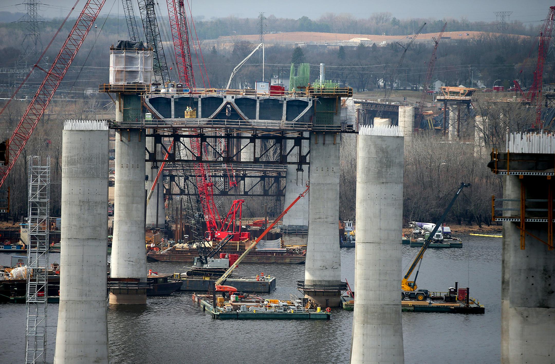 Construction crew worked high above the St. Croix on the bridge that will connect Wisconsin and Minnesota, Friday, April 10, 2015 near Stillwater, MN. ] (ELIZABETH FLORES/STAR TRIBUNE) ELIZABETH FLORES &#x2022; eflores@startribune.com