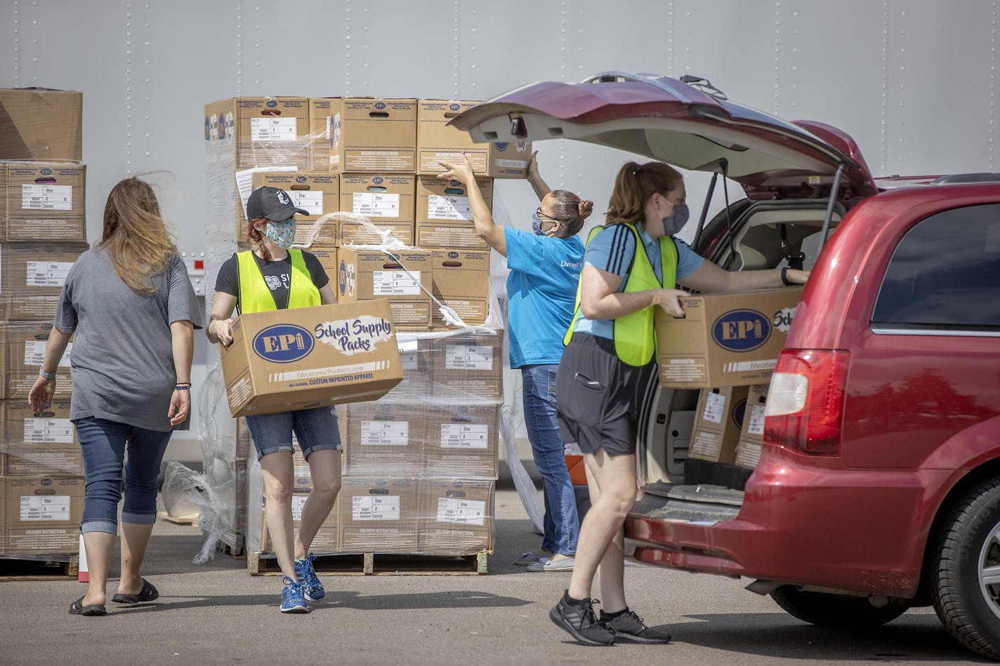 Volunteers loaded boxes for 84 metro area nonprofits and school districts receiving school supplies at the annual Greater Twin Cities United Way's distribution event at Allianz Field on Aug. 13, 2020 in St. Paul.