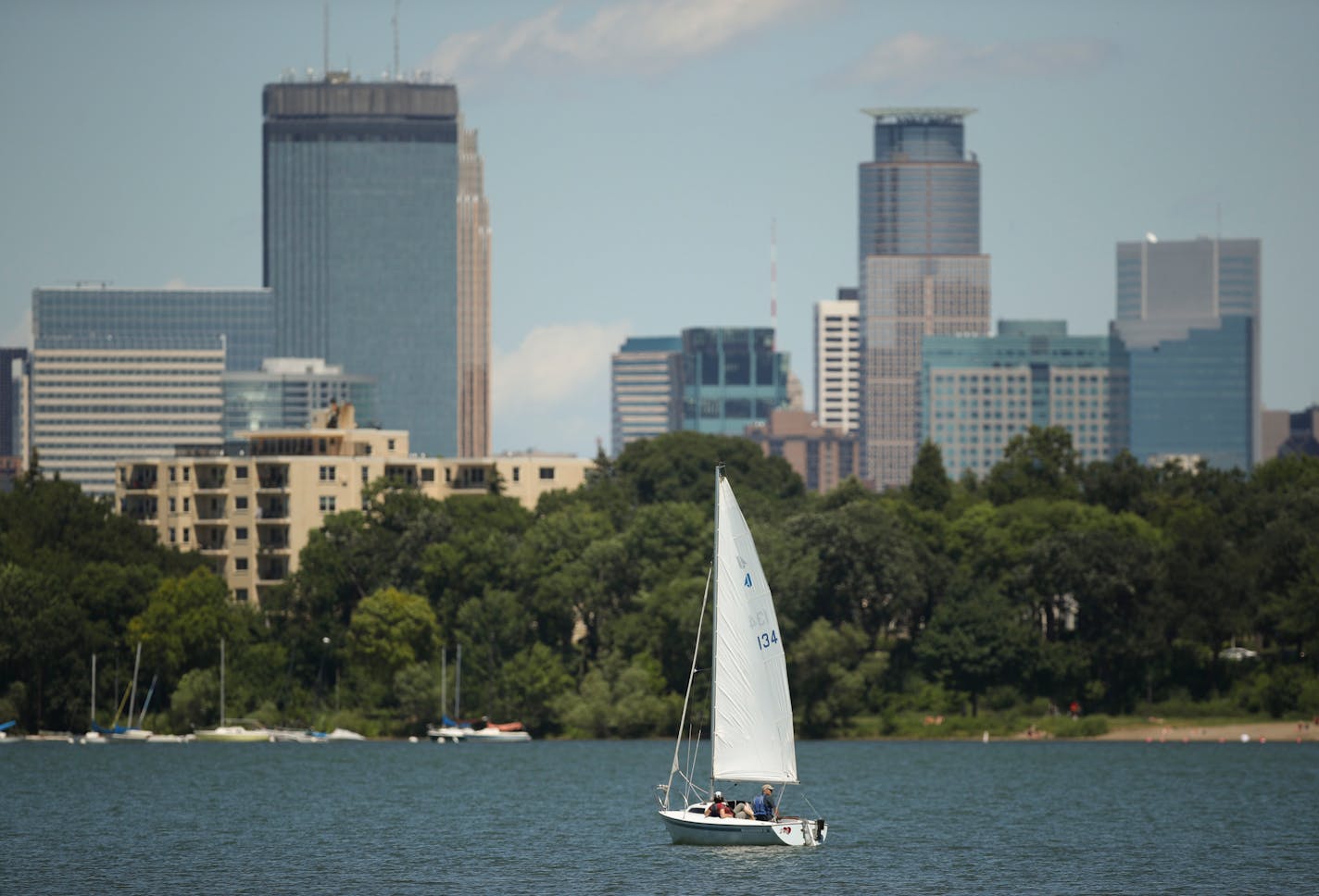 Minneapolis is ready to throw down over the name "Calhoun" again. Following the lead of the Minneapolis Park and Recreation Board and the Minnesota Department of Natural Resources, the federal government now recognizes Lake Calhoun as Lake Bde Maka Ska. Swimmers jumped off the raft off Thomas Beach into Lake Bde Maka Ska Monday afternoon, July 16, 2018.