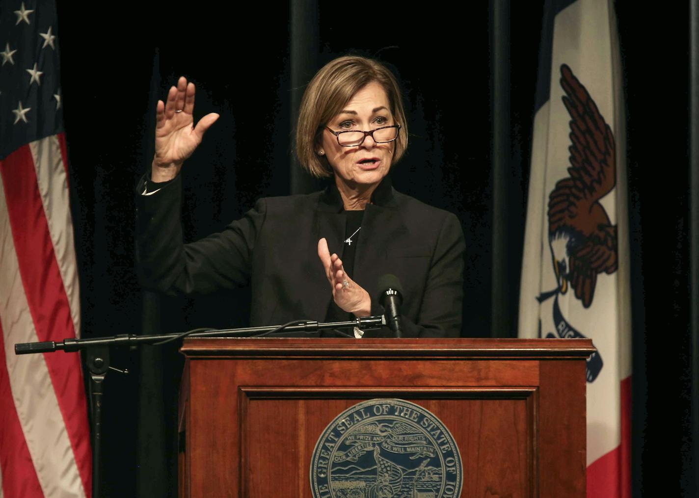 Iowa Gov. Kim Reynolds holds a press conference in Johnston, Iowa, on Dec. 3.