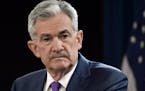 FILE- In this Sept. 26, 2018, file photo Federal Reserve Chairman Jerome Powell listens to a question during a news conference in Washington. The Fede
